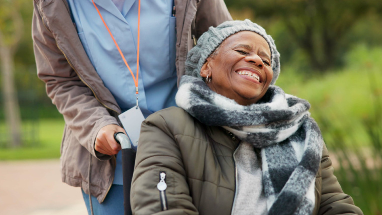 "A nurse providing care to a patient. Sungardens Hospice care services."